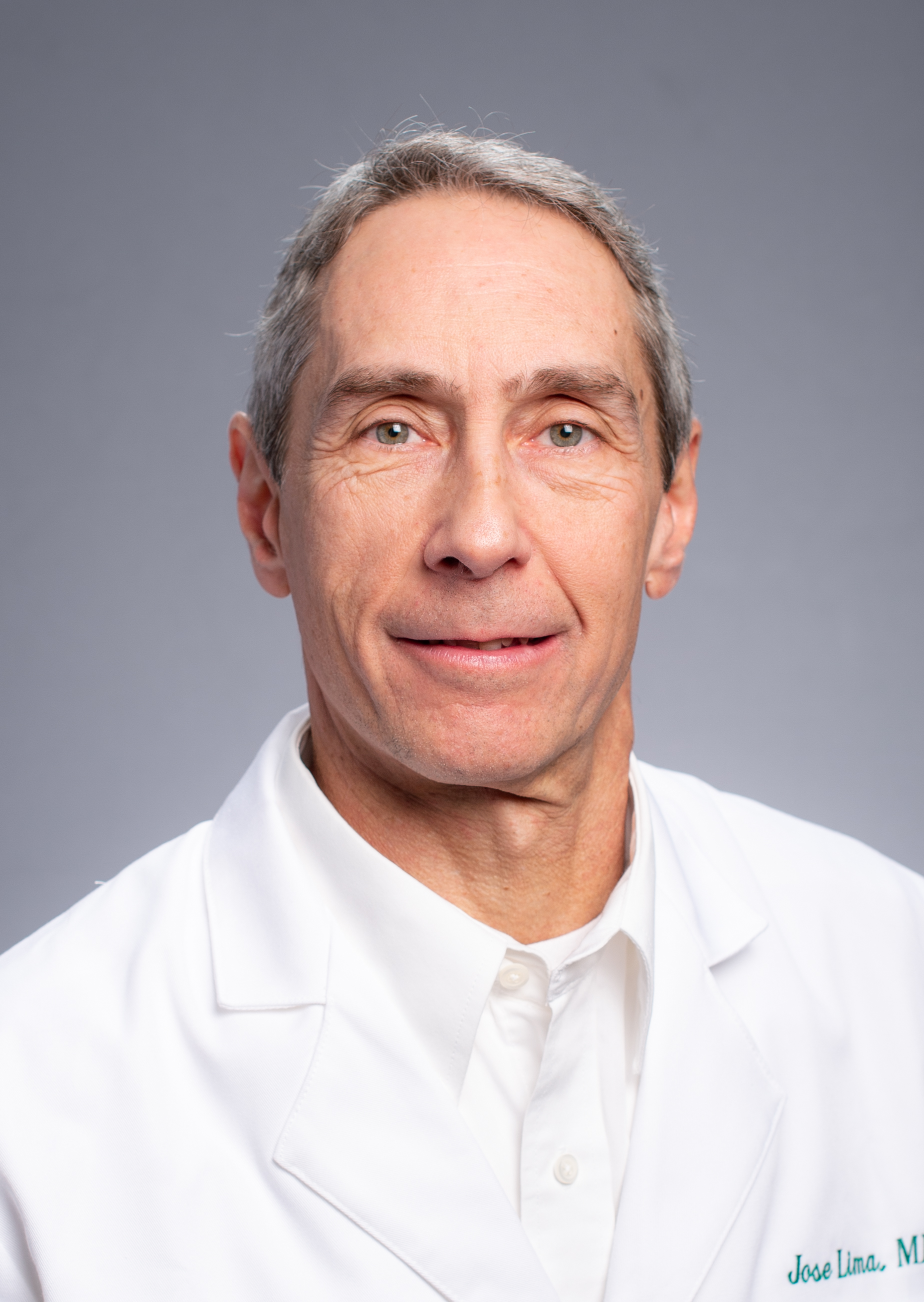 Headshot of Jose Lima (Assistant Professor, Laboratory Medicine) in white medical coat, 2020.