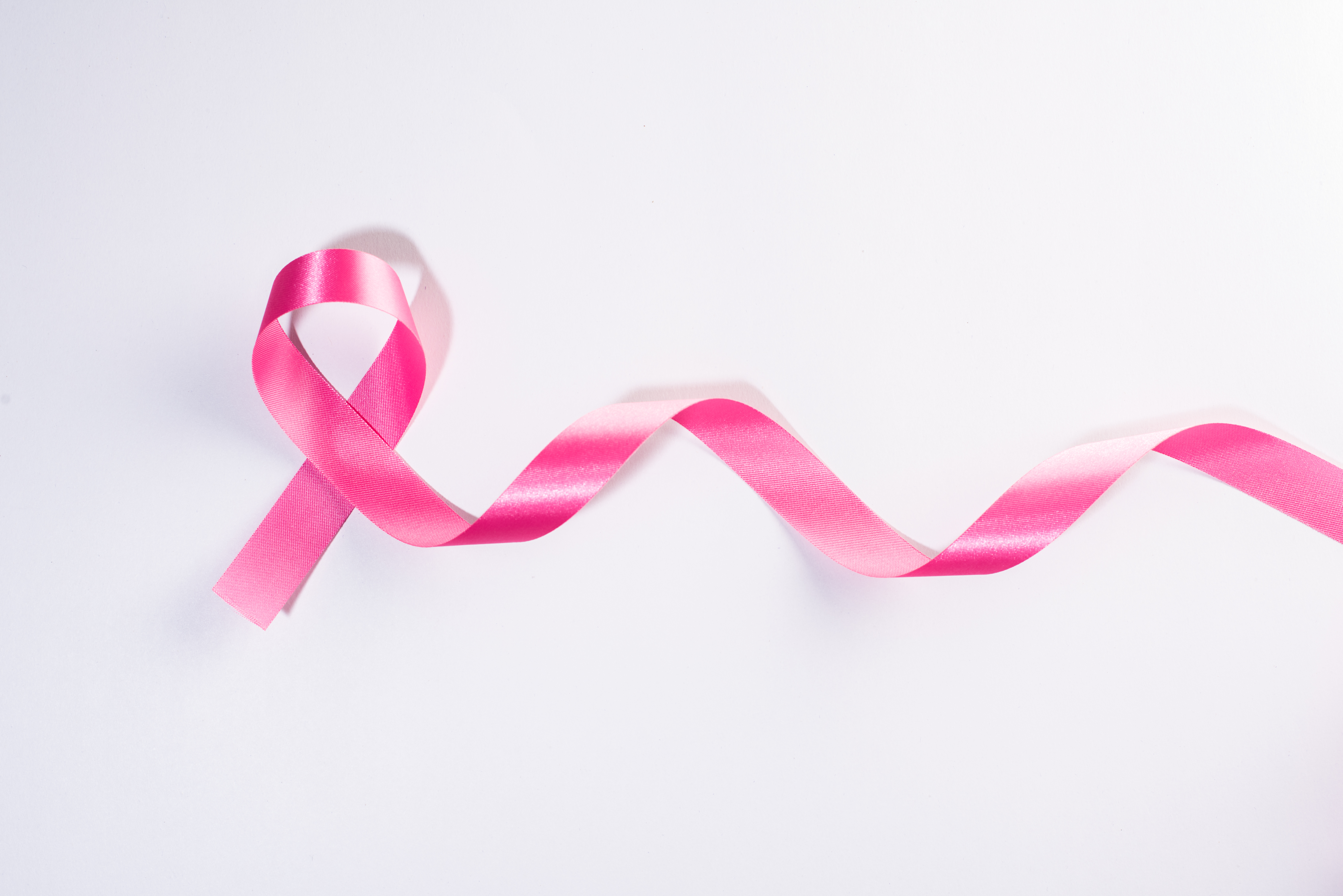 pink ribbon cancer sign white