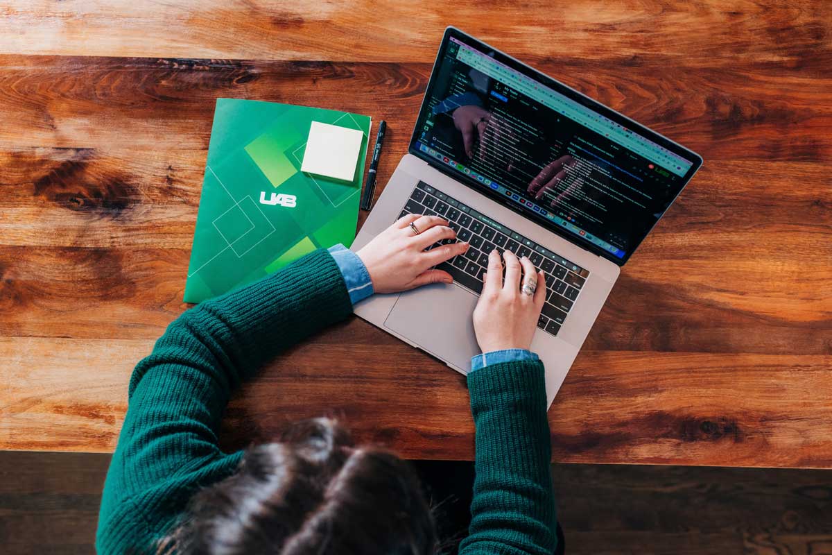 student with computer