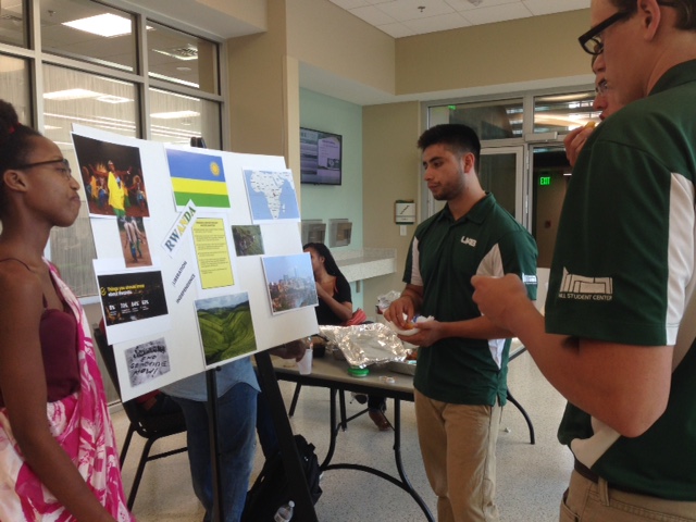  Sharon Uwanyuze, a UAB student from Rwanda, talks to other students about Rwanda Liberation Day in the Hill Student Center on July 5.