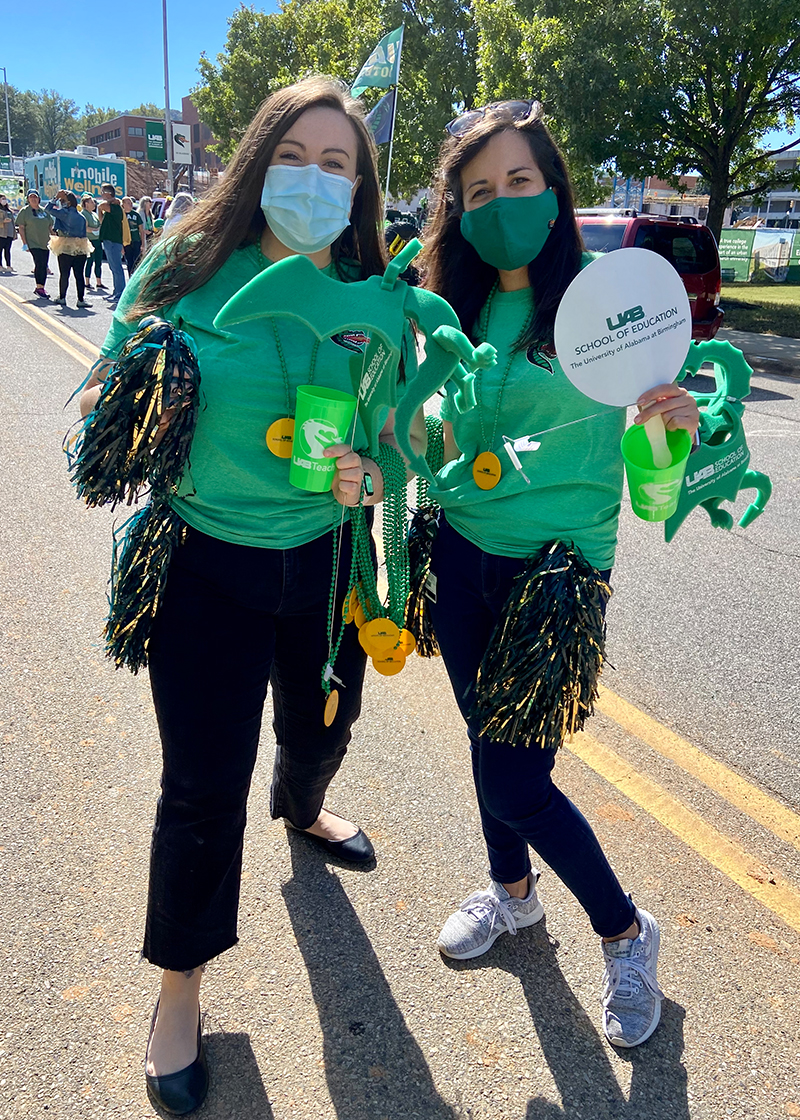 Dr. Julie Paul and Dr. Mary Rose Salllese at the 2022 UAB Homecoming Parade