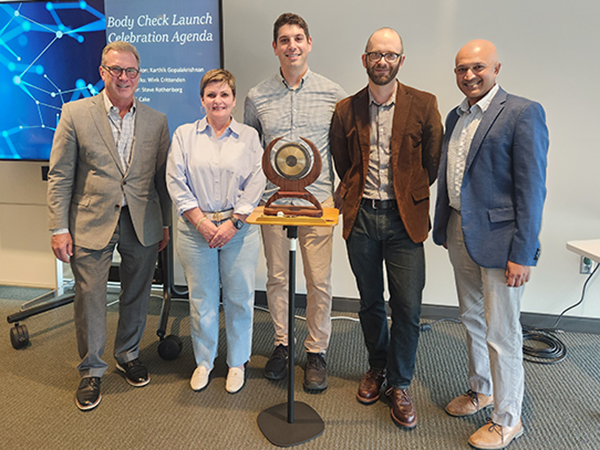 Terry Chapman, Kathy Nugent, Steven Rothenberg, Wink Crittenden and Karthik Gopalakrishnan pose for a photo at the Body Check Start-up Launch Celebration.