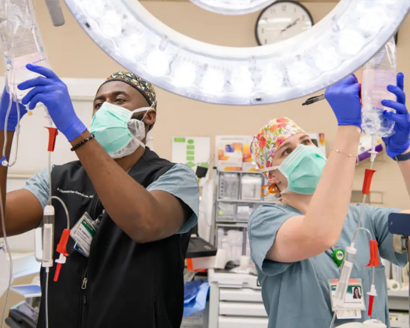 two anesthesiologists preparing for surgery