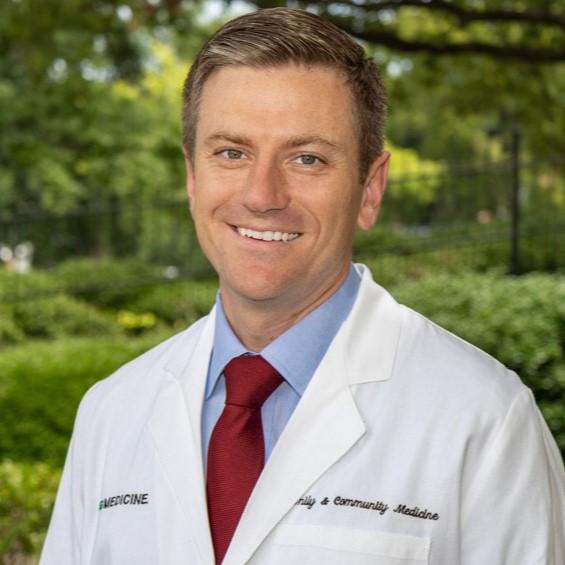 John Lax, M.D.