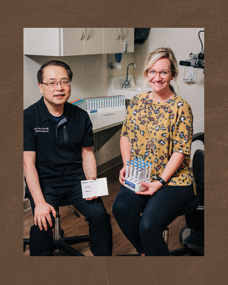 Do-Yeon Cho, M.D., (left) and Carly Bramel, P.A., (right) pose with Odofin smelling sticks- a tool for testing the severity of smell loss or dysfunction.  