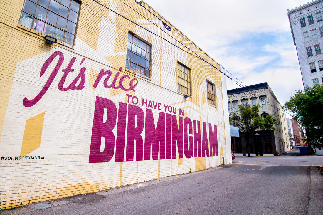 Downtown Birmingham mural that says "It's nice to have you in Birmingham"