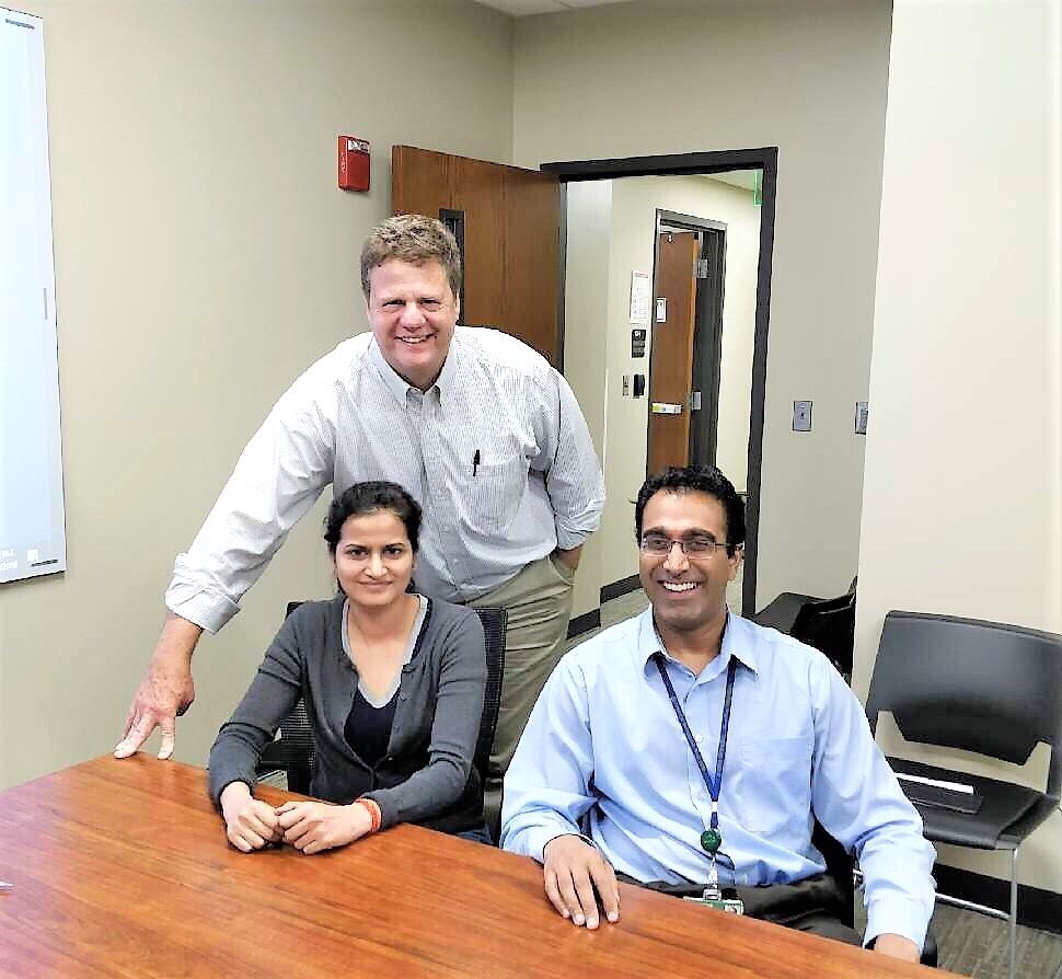 Clockwise from top left: Dr. James Bibb, Dr. Sushanth Reddy and Dr. Priyanka Gupta are researching two rare kinds of neuroendocrine tumors using precision medicine.
