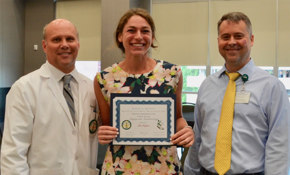 Medical student Elle Kaplan wins first place in her poster group at Medical Student Research Day on Aug. 7.