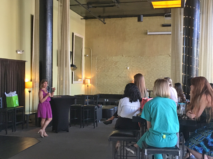 Dr. Taylor Riall speaks to Women in Surgery attendees at the Wine Loft on Monday, April 10, 2017.
