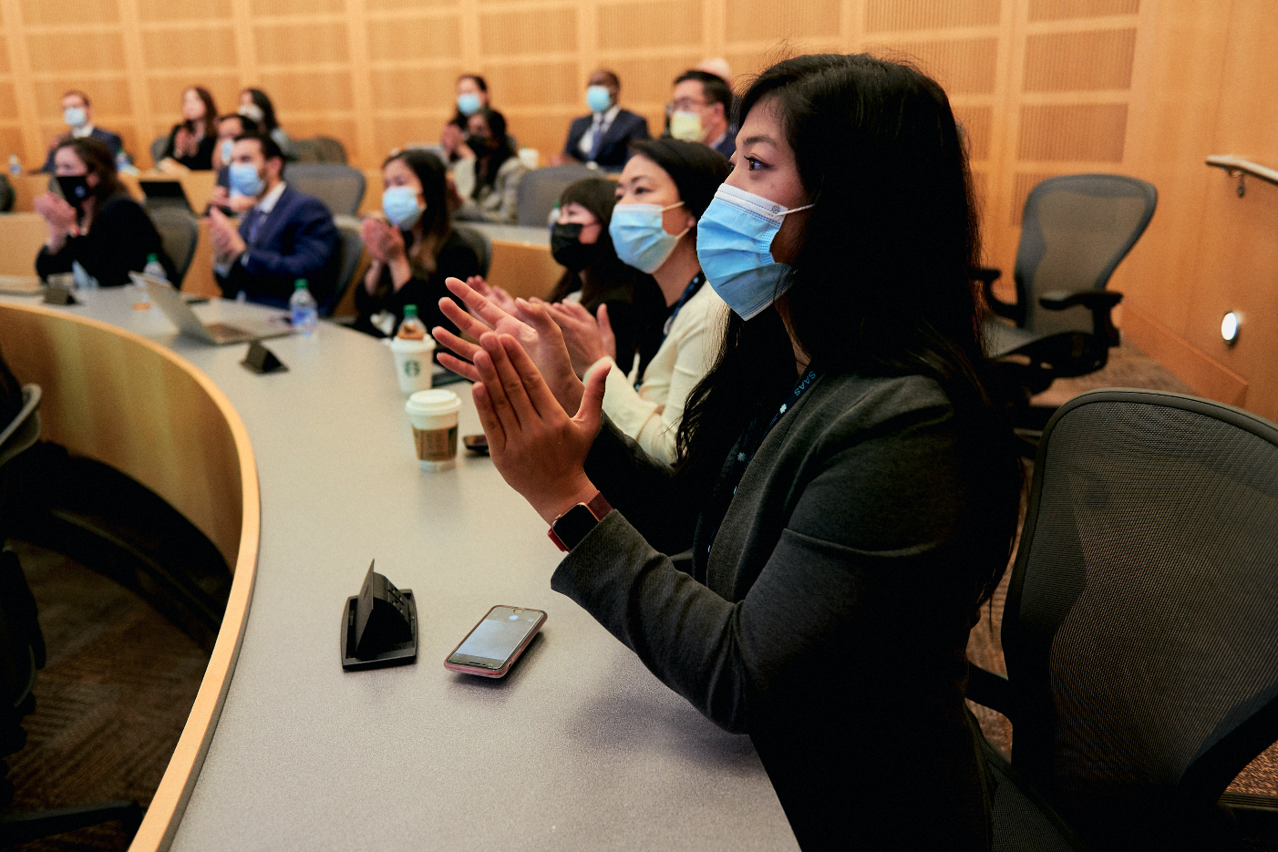 Dr. Connie Shao and trainees clapping