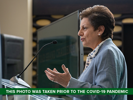 From side, Dr. Mona Fouad, MD (Professor/Senior Associate Dean, Preventive Medicine) is speaking at podium after being announced the winnter at the 2019 UAB Grand Challenge Award Announcement in the Hill Student Center, Performance Lounge on April 30, 2019.