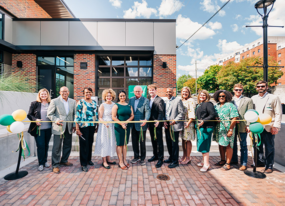 student assembly building ribbon cutting