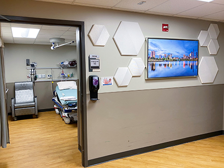 Hospital hallway with art of Birmingham skyline