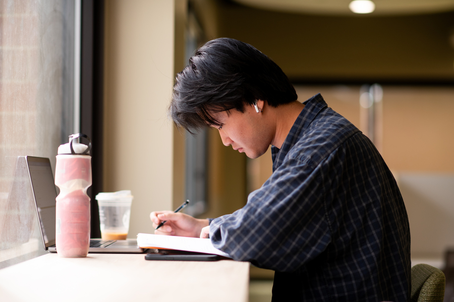 male student studying