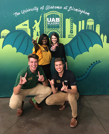 University Relations artist Rachel Hendrix, a 2018 alumna, designed portable dragon wings for the Office of Undergraduate Admissions