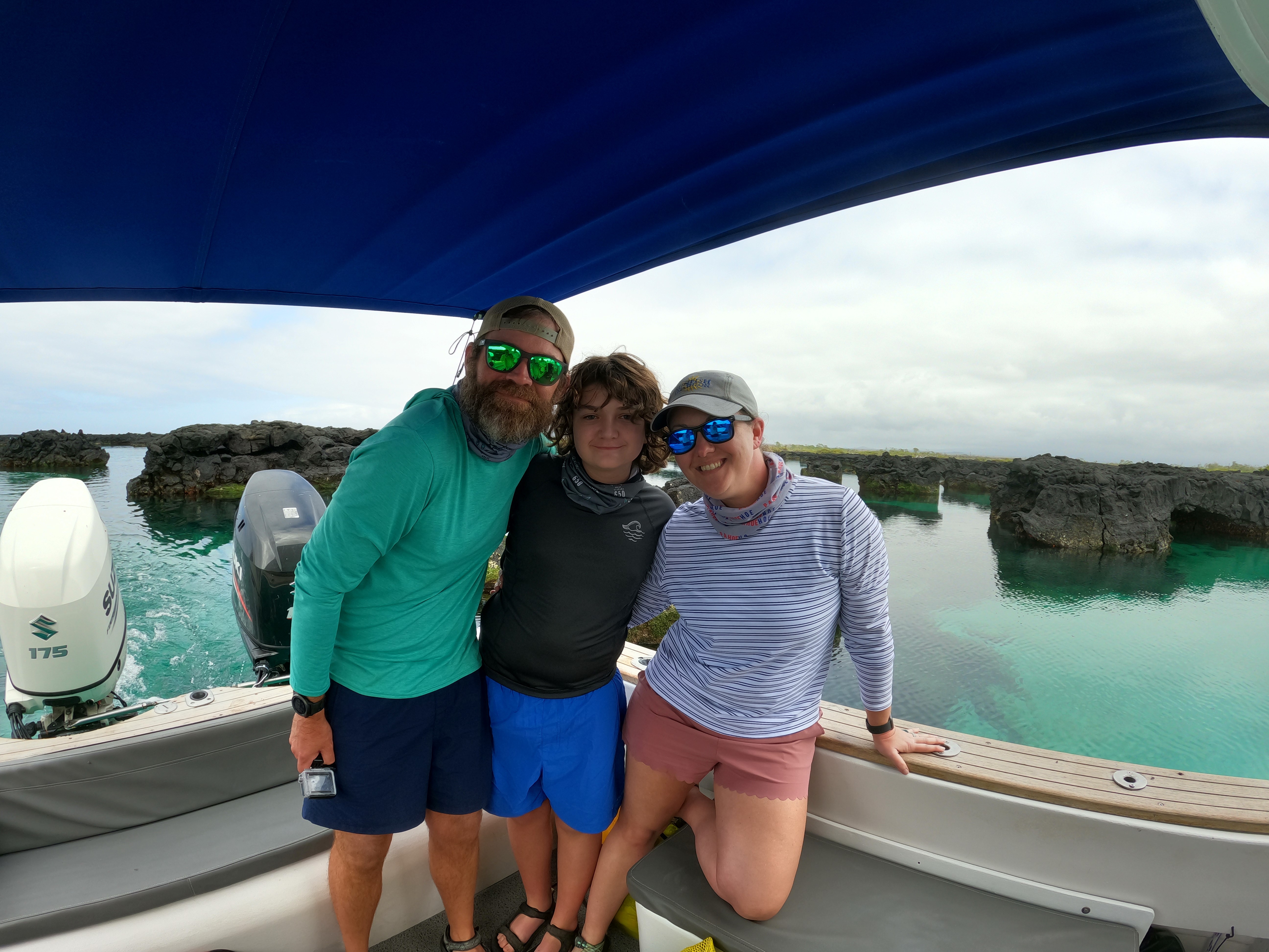 Dr. Wingo and her husband, Greg, and her 14-year-old son, Shepard, prepare to snorkel in the Galapagos Islands. 