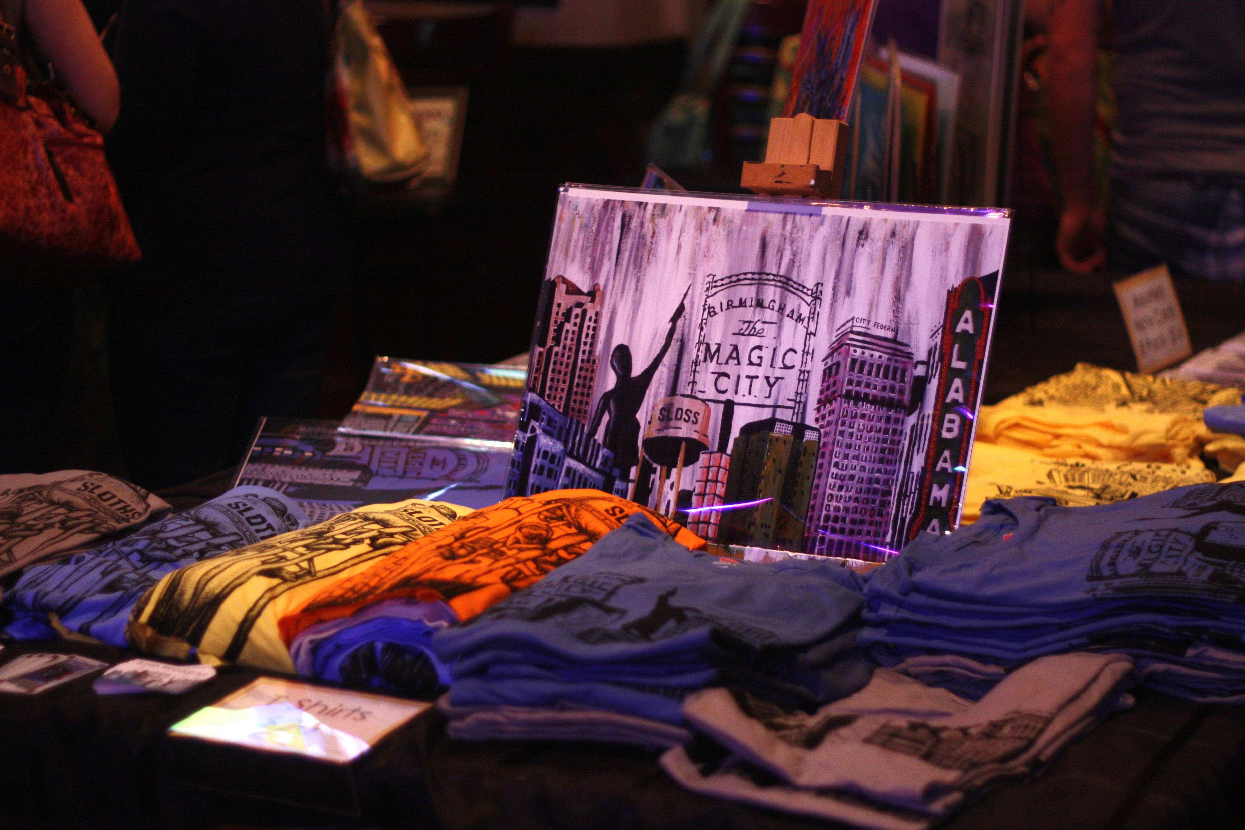 Local art and t-shirts on sale at the Fall Bazaar. (Photo by Sarah Adkins).