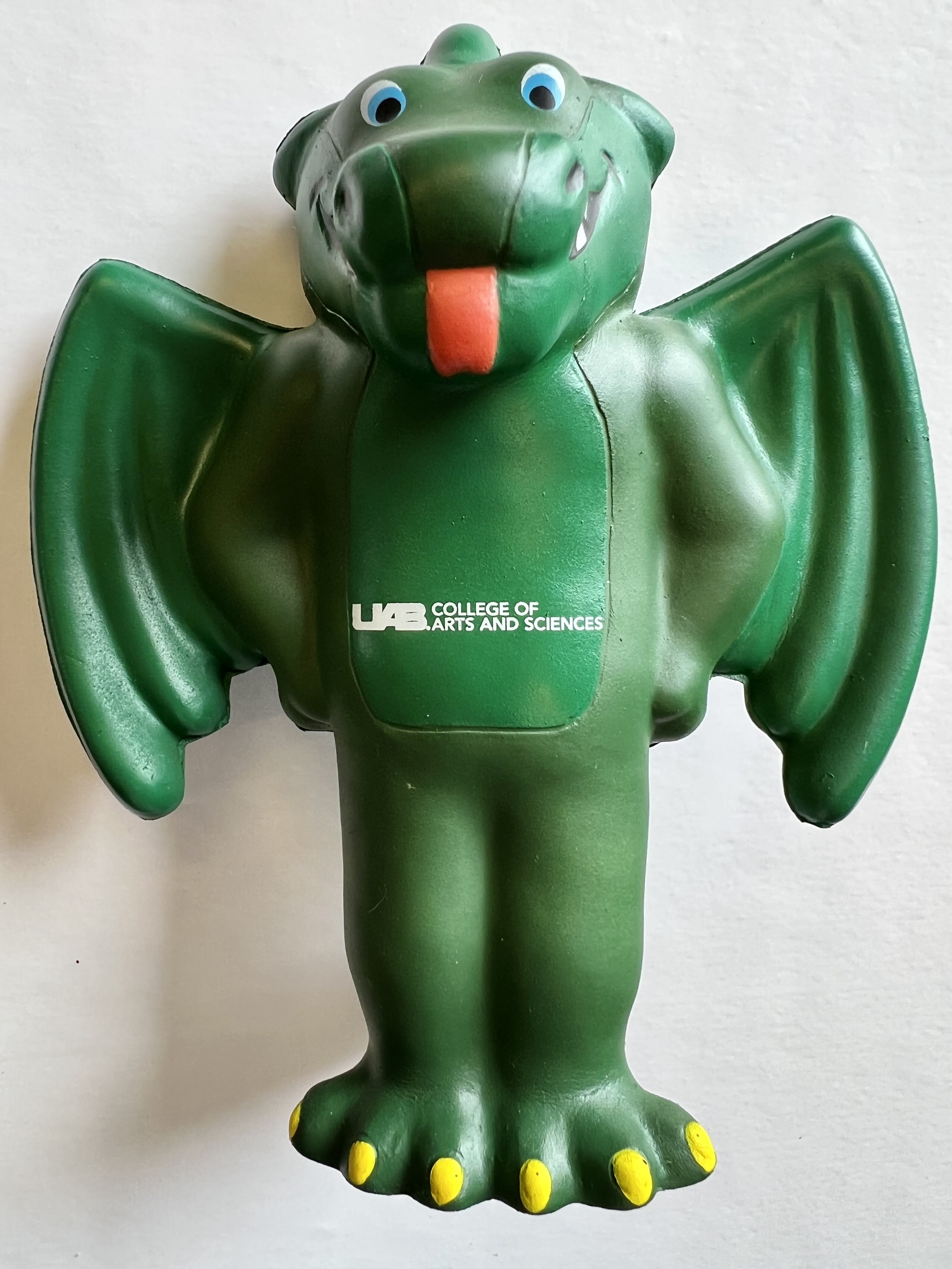 Green vinyl Blaze squeeze toy, with wings and a silly expression.