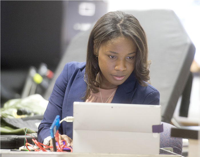 Photo of Ophelia Johnson working on computer