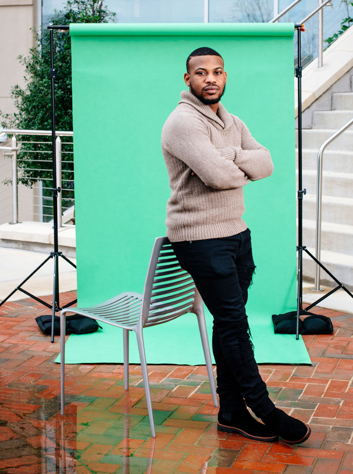 Photo of Jakorre Thornton against green backdrop and photo lights